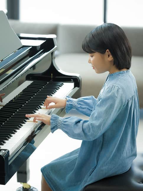 A girl playing the piano