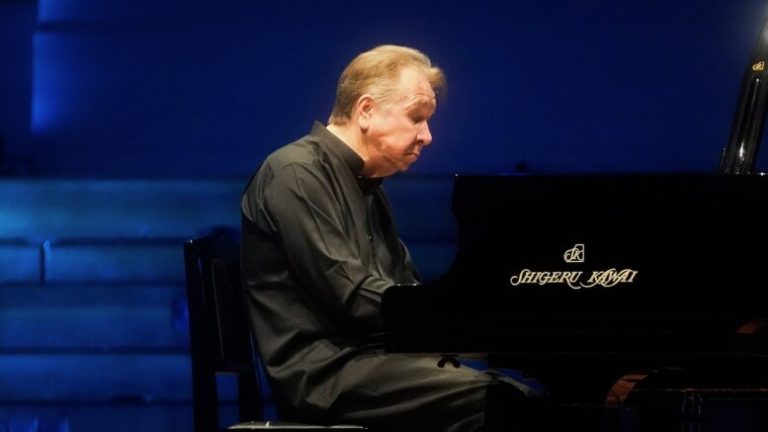 A woman playing the piano